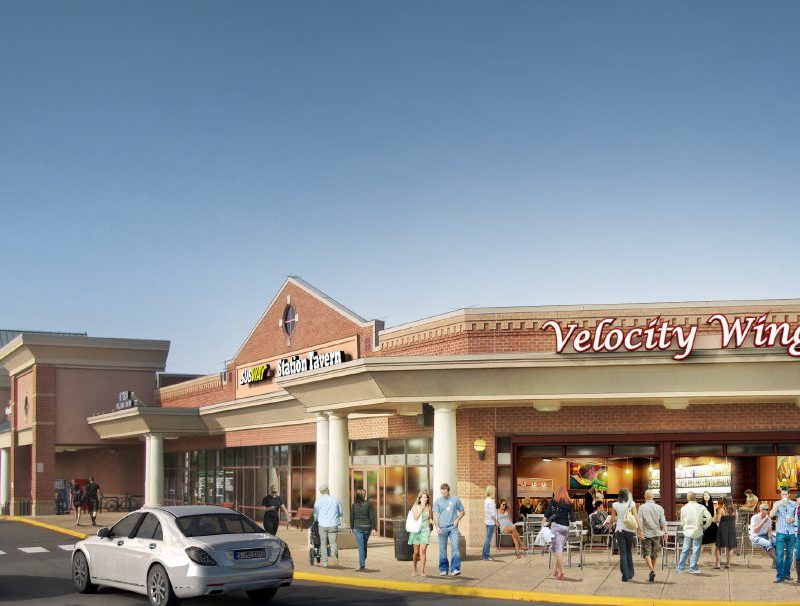 Velocity Wings building with cars and people