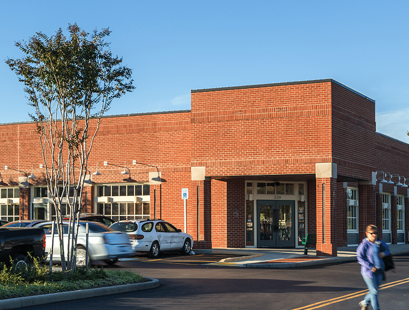 shop parking lot car woman