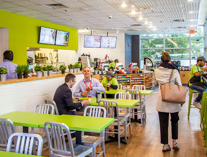 Restaurant with tables and employees