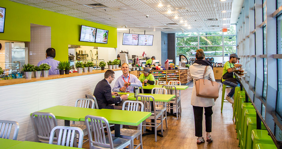 Restaurant with tables and employees