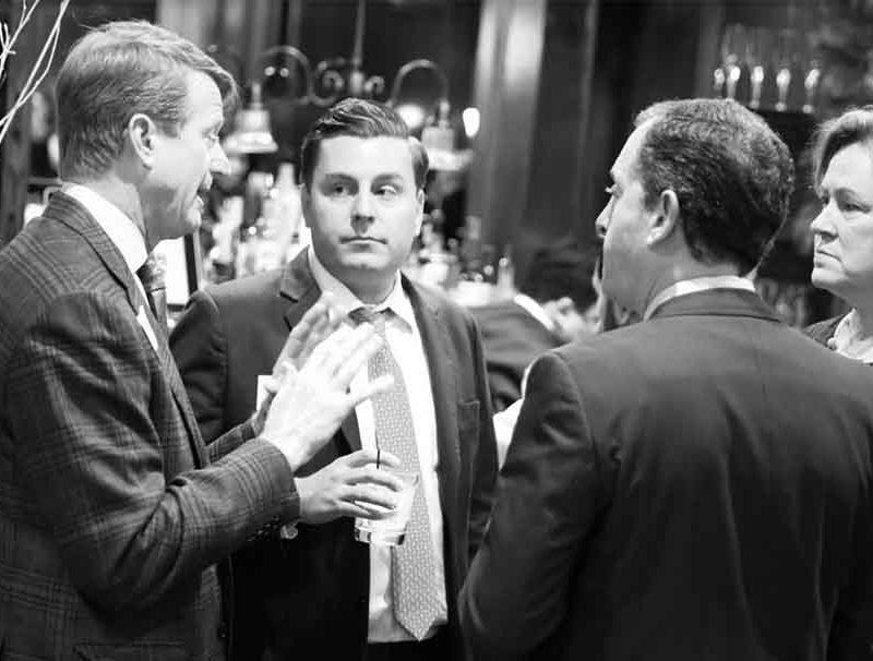 Black and white image people talking