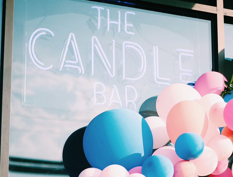 The Candle Bar sign