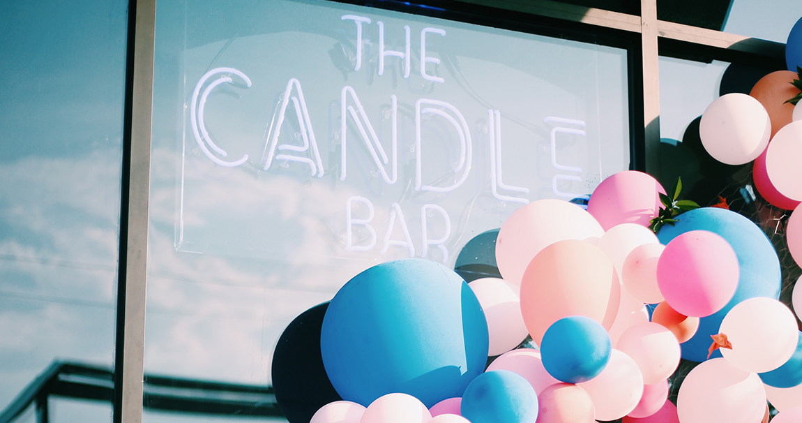 The Candle Bar sign