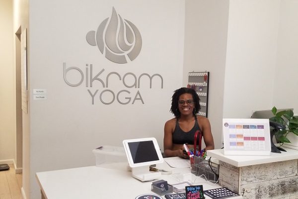 bikram-yoga-lobby-woman-working