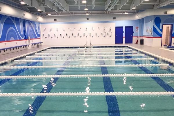 blue-swimming-pool-indoors-with-white-lane-dividers