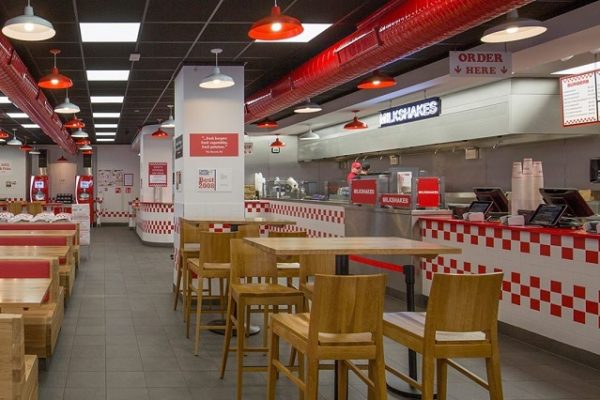 inside-fast-food-restaurant-red-lights-wooden-chairs