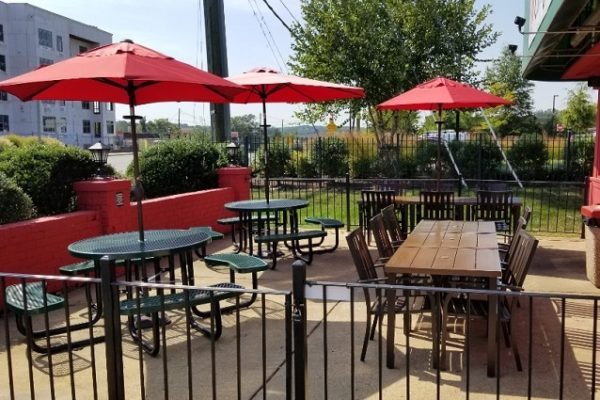 restaurant-patio-red-umbrellas-black-tables-and-chairs-trees restaurant-patio-red-umbrellas-black-tables-and-chairs-trees