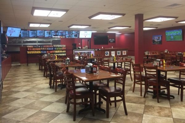 restaurant-with-wooden-chairs-and-table-and-tile-flooring