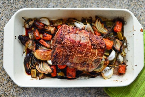 roast-meat-with-vegetables-in-a-dish-granite-counter