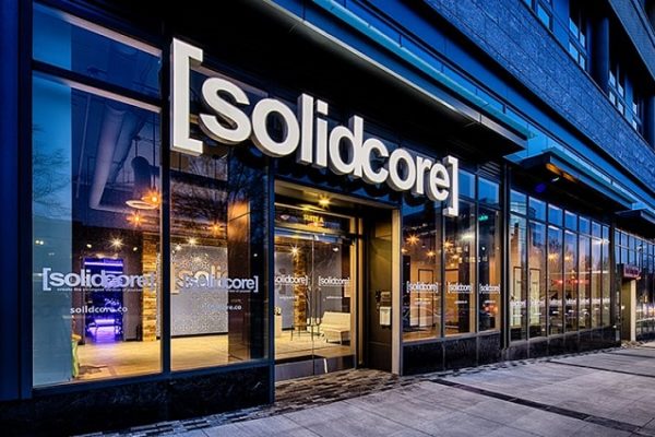 solidcore-sign-on-glass-doors