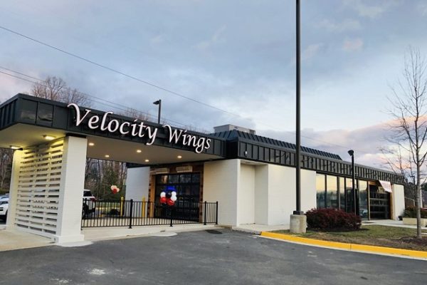 velocity-wings-sign-restaurant-blue-sky