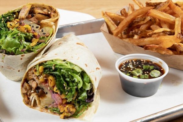 wraps-and-fries-on-paper-wooden-table