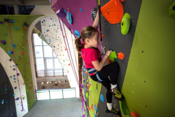 girl-rock-climbing-inside