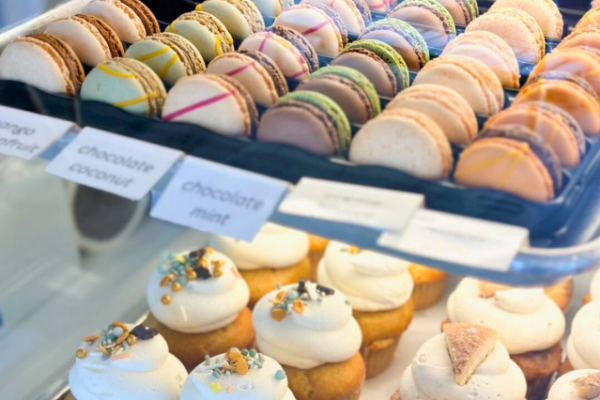 danas_cake_shoppe_6 bakery case with cupcakes and macarons