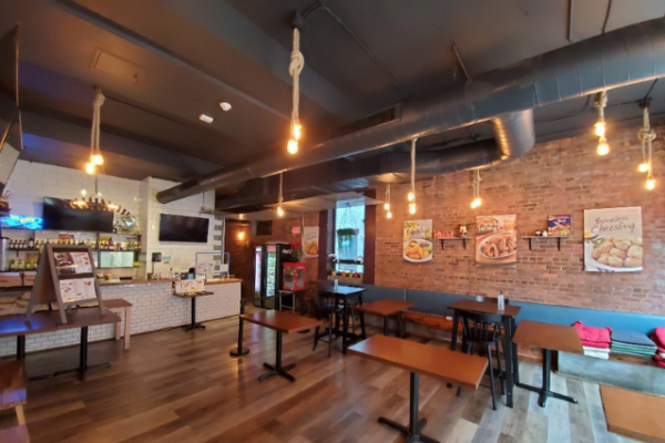 bb.q_1 bb.q restaurant interior with hardwood floors and tables and chairs