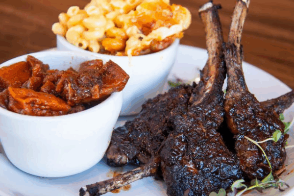 miss_toyas_4 oxtails plated with mac & cheese and sweet potatoes in smaller ceramic bowls